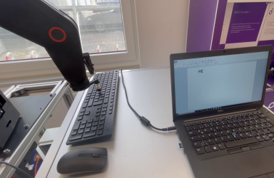 Five-axis robot tests keyboard