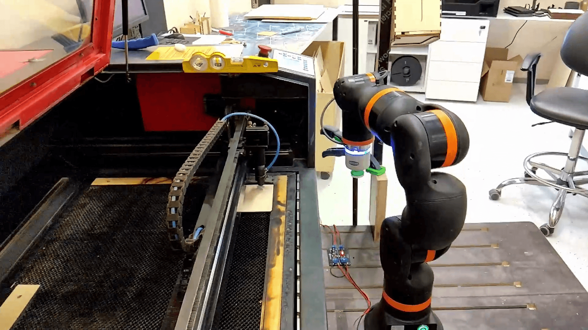 Automated loading and unloading of a laser engraving machine